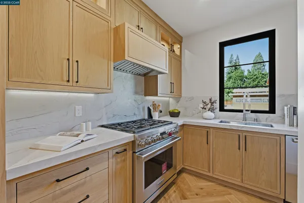 a living room with a couch and a potted plant