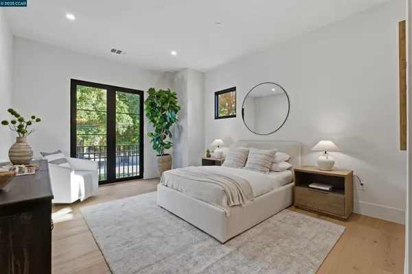 a living room with furniture and a lamp