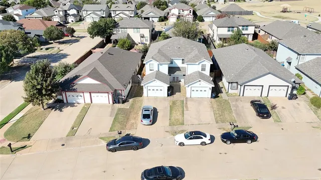 with a vase of flowers sitting on a table