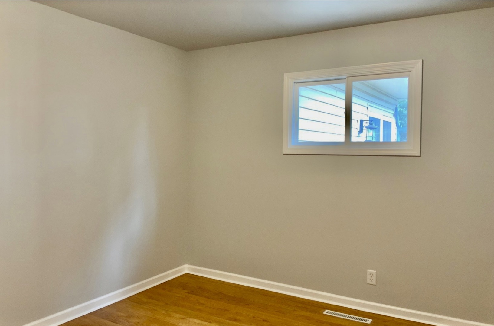 3929 Pinecrest Road Rockford, IL 61107 - Photo 19 of 33 a view of a small space with wooden floor and a window