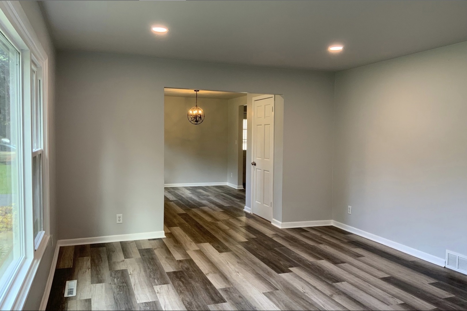 3929 Pinecrest Road Rockford, IL 61107 - Photo 29 of 33 an empty room with wooden floor