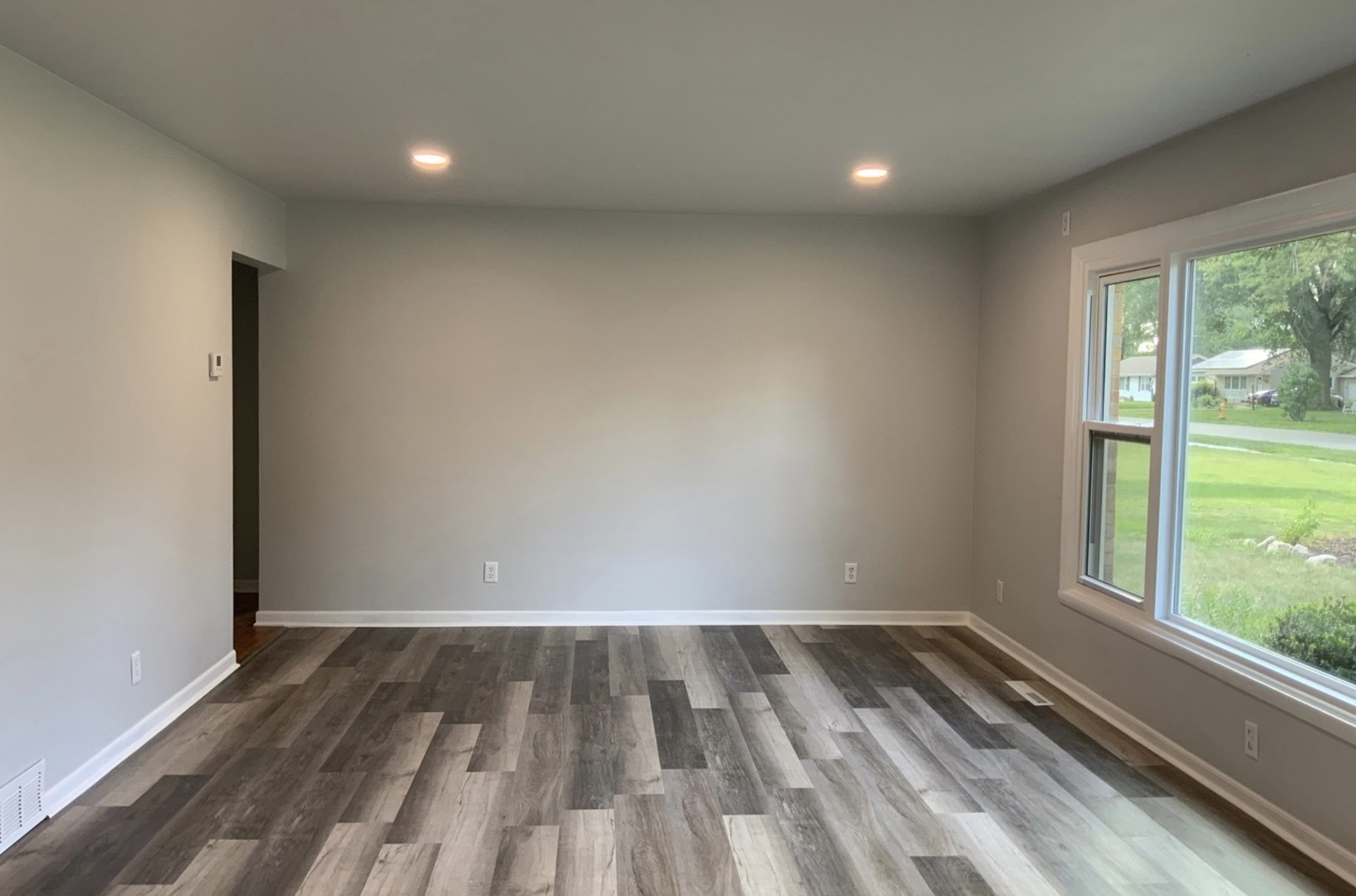 3929 Pinecrest Road Rockford, IL 61107 - Photo 5 of 33 a view of wooden floor in a room