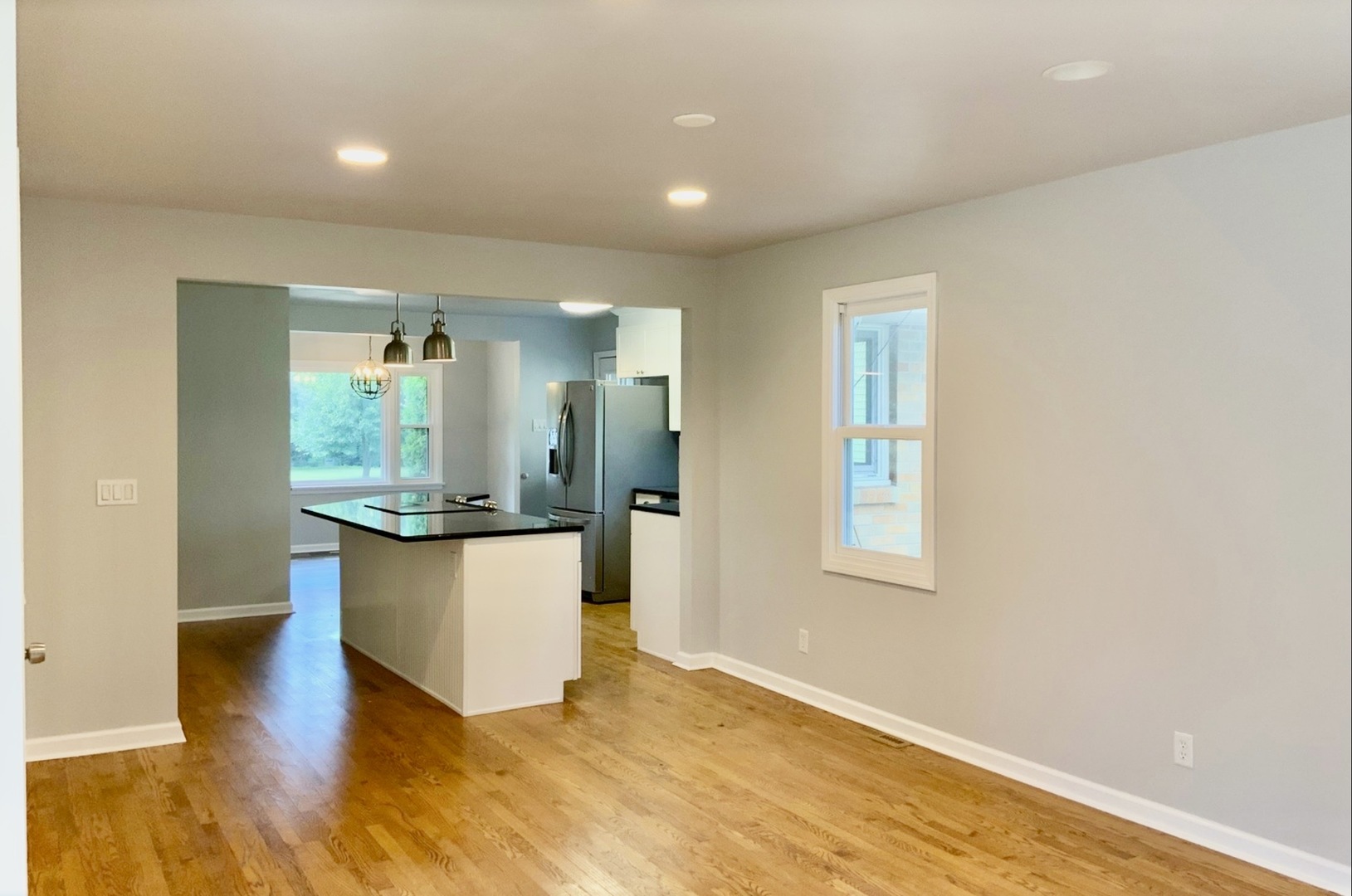 3929 Pinecrest Road Rockford, IL 61107 - Photo 10 of 33 a view of a kitchen with wooden floor and electronic appliances