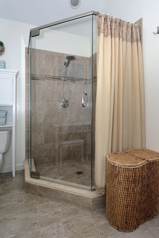 52 Powder Hill Way, Unit 52 Westborough, MA 01581 - Photo 20 of 38 a bathroom with a shower