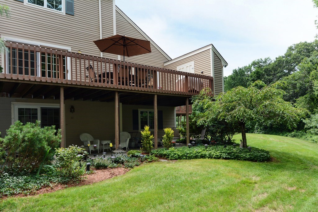 52 Powder Hill Way, Unit 52 Westborough, MA 01581 - Photo 33 of 38 a front view of a house with garden