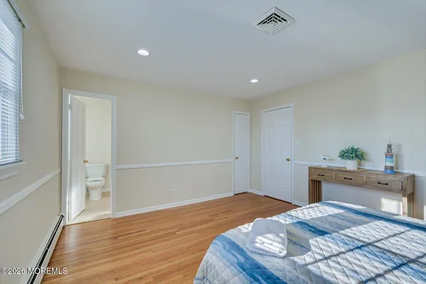 a view of a patio with table and chairs