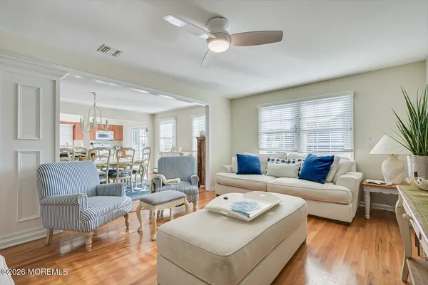 a kitchen with stainless steel appliances granite countertop a refrigerator sink and stove