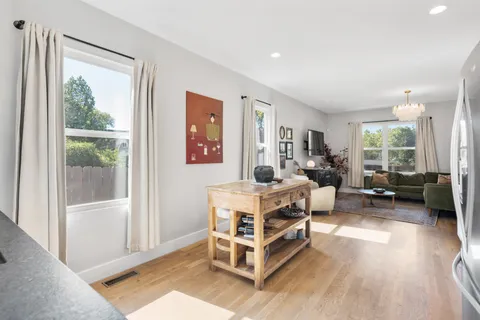 a bed room with a bed and a window