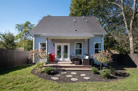 a view of house with a patio