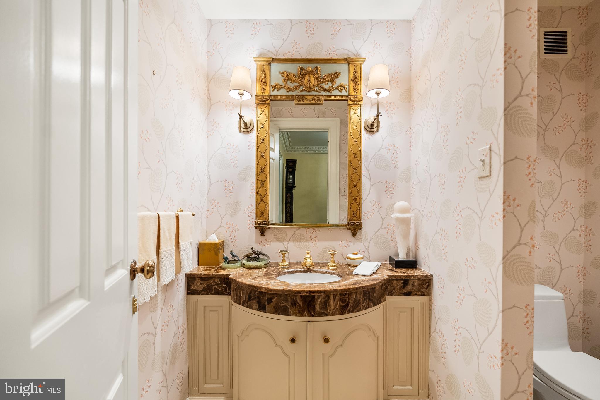2700 Calvert Street Northwest, Unit 418 Washington, DC 20008 - Photo 11 of 28 a bathroom with a sink and a mirror