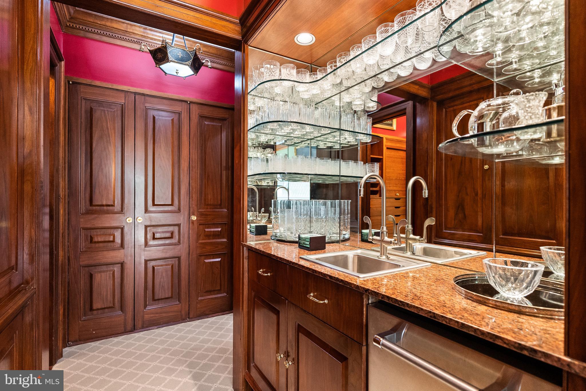 2700 Calvert Street Northwest, Unit 418 Washington, DC 20008 - Photo 14 of 28 a bathroom with a sink and a mirror