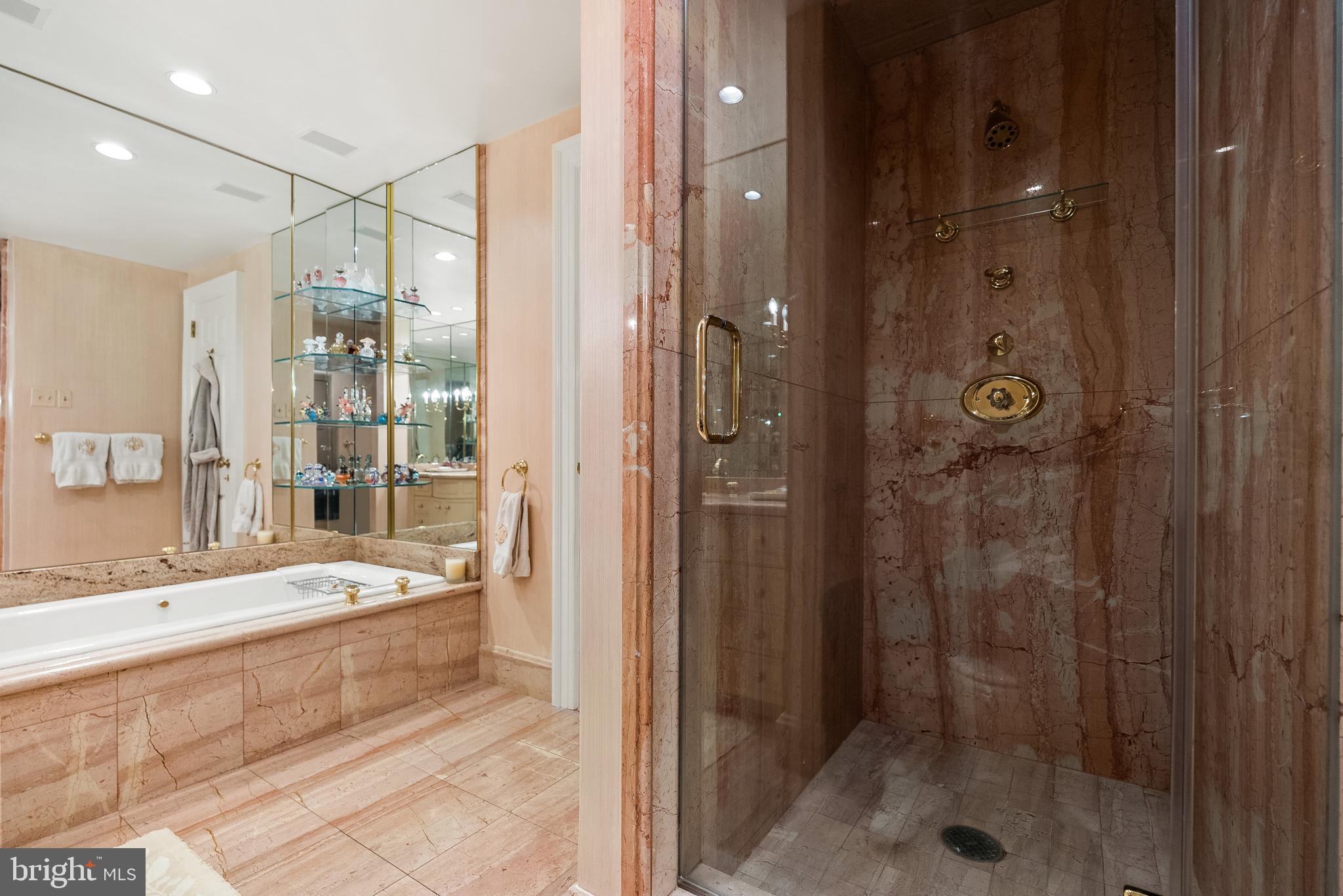 2700 Calvert Street Northwest, Unit 418 Washington, DC 20008 - Photo 18 of 28 a bathroom with a tub shower and sink