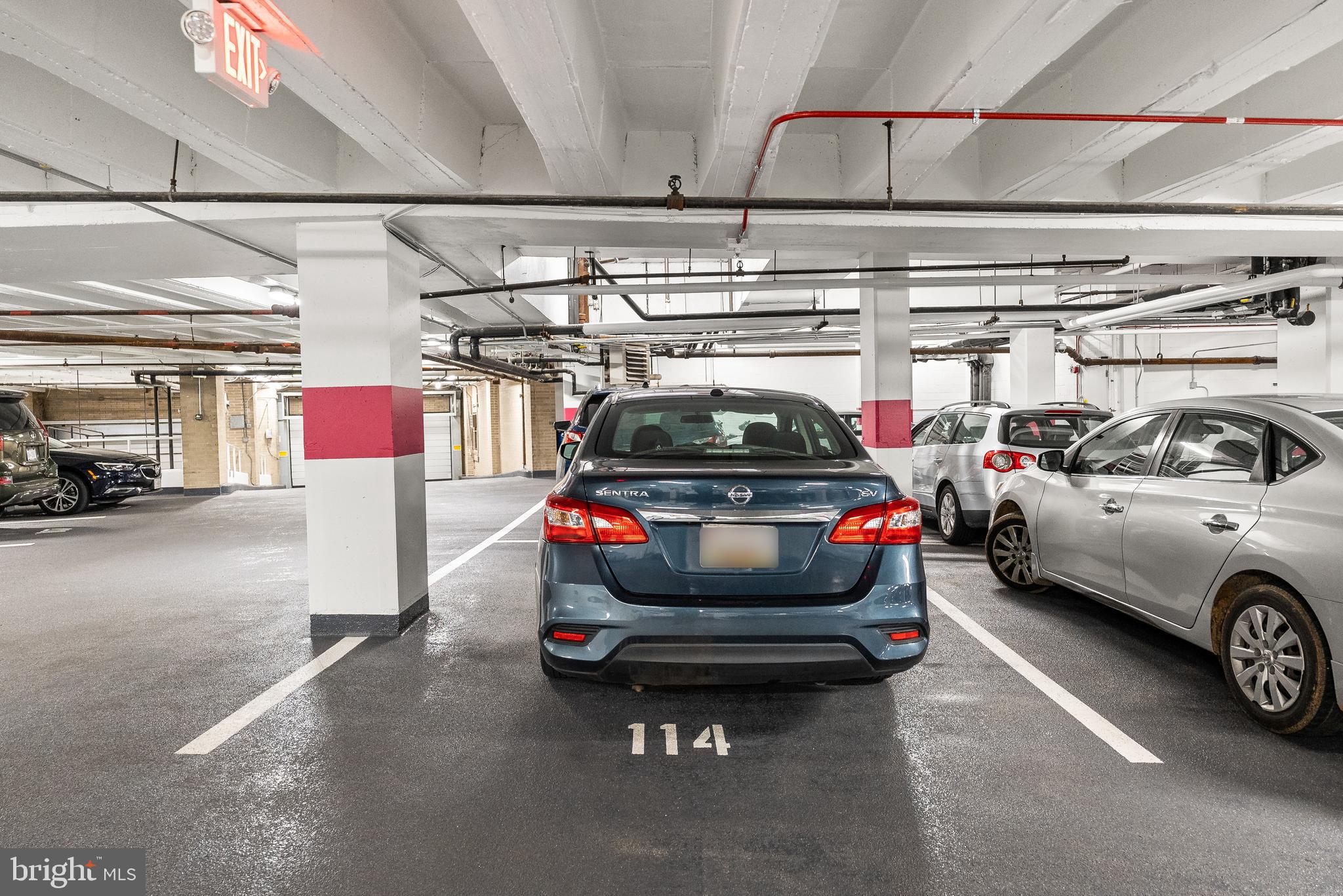 2700 Calvert Street Northwest, Unit 418 Washington, DC 20008 - Photo 25 of 28 a view of parking garage with cars