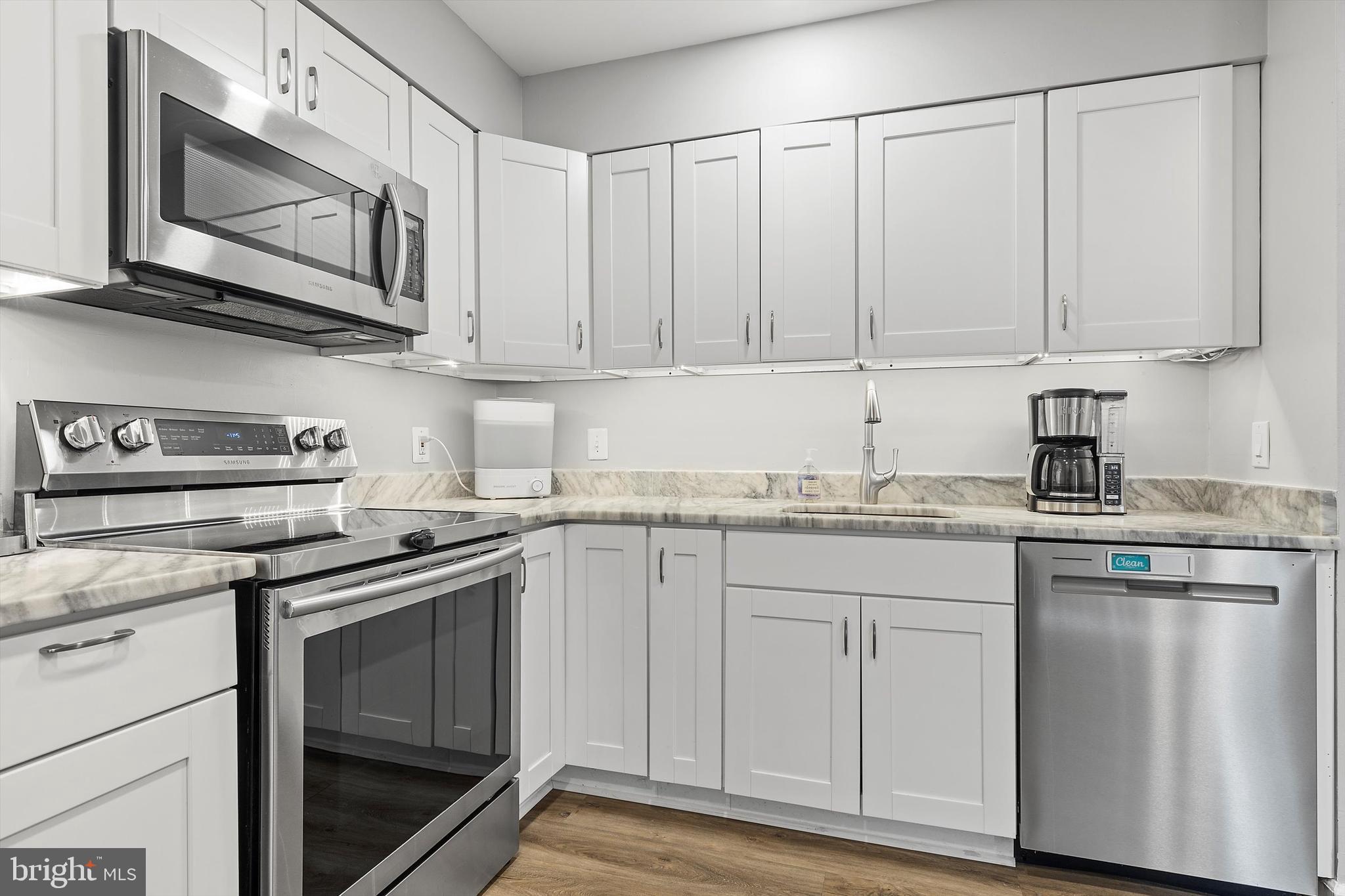 3135 Apple Road Northeast, Unit 4 Washington, DC 20018 - Photo 4 of 22 Updated Kitchen with Stainless Appliances