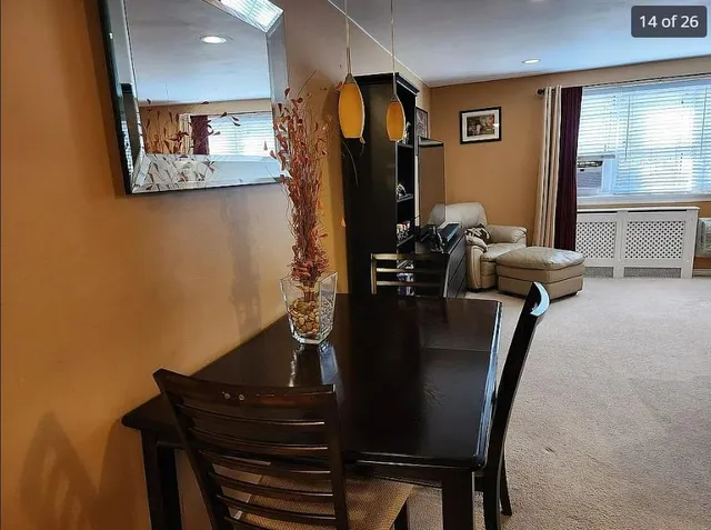 a view of a workspace with furniture