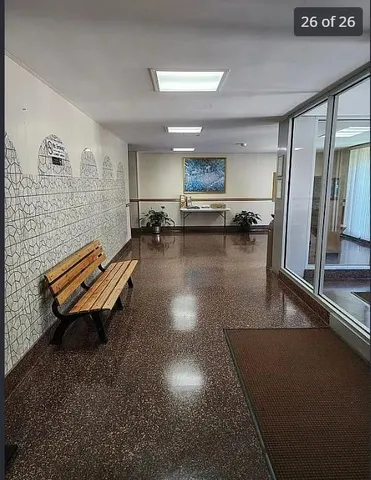 a gym room with furniture and a pool table