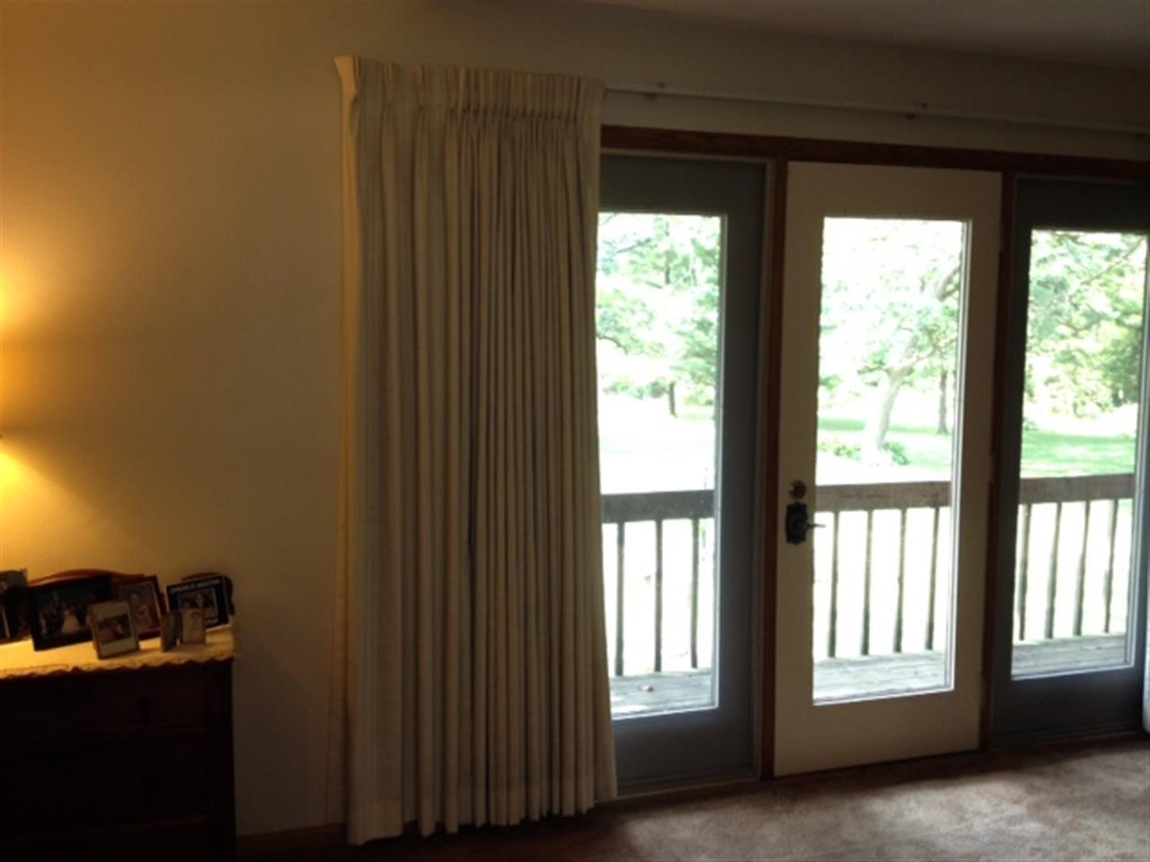 3613 East Oak Grove Road Byron, IL 61010 - Photo 7 of 24 a view of an empty room and a window