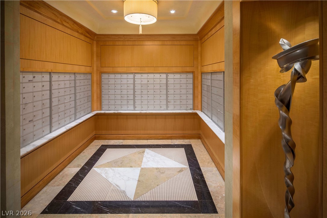 2777 Paradise Road, Unit 807 Las Vegas, NV 89109 - Photo 57 of 61 Elegant lobby with rich wood paneling and a striking marble and tile floor mosaic.