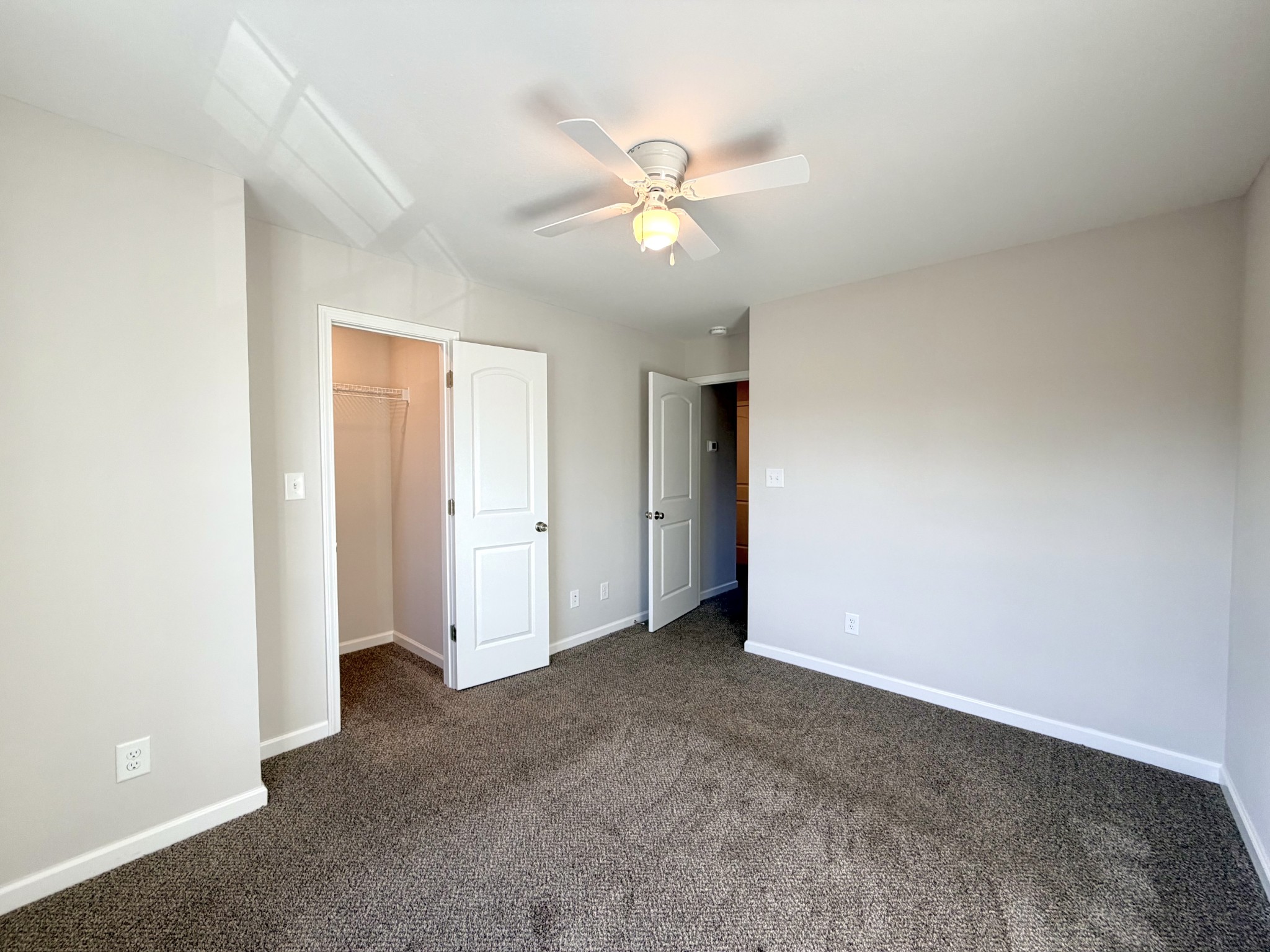 509 Britton Springs Road, Unit B3 Clarksville, TN 37042 - Photo 20 of 20 an empty room with a ceiling fan and a window
