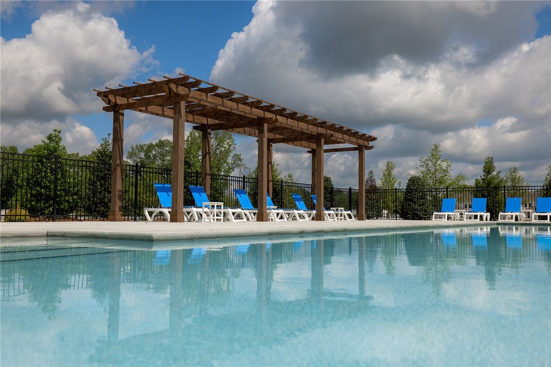 320 Coscoroba Road Auburn, AL 36832 - Photo 23 of 27 Relax poolside under the shade of a charming pergola, perfect for leisurely afternoons.