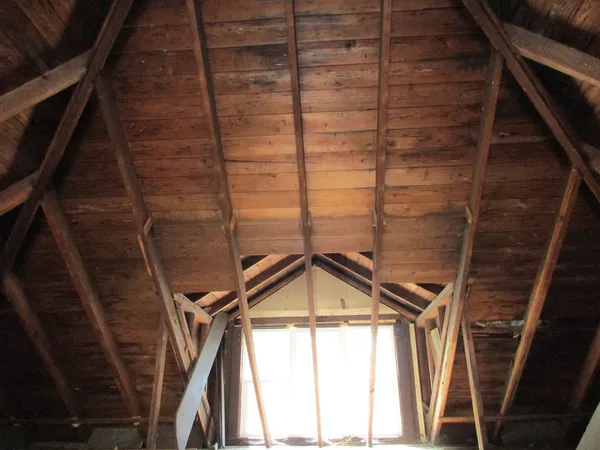 a bathroom with a window and a shower