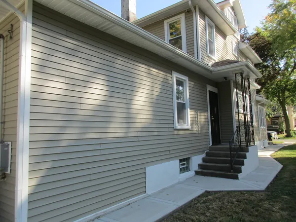 a view of a house with a white door