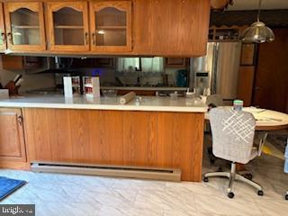 1265H Swamp Bridge Road Denver, PA 17517 - Photo 12 of 13 a view of a kitchen with granite countertop a sink and a stove