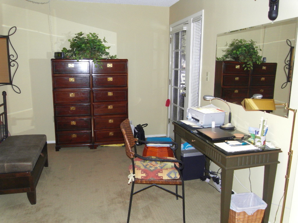 709 South Power Road, Unit 204 Mesa, AZ 85206 - Photo 12 of 27 a room with furniture and view of living room