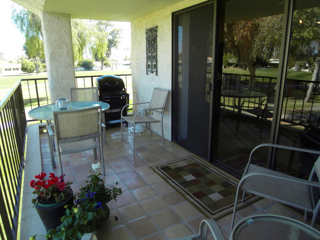 709 South Power Road, Unit 204 Mesa, AZ 85206 - Photo 3 of 27 a view of a porch with furniture