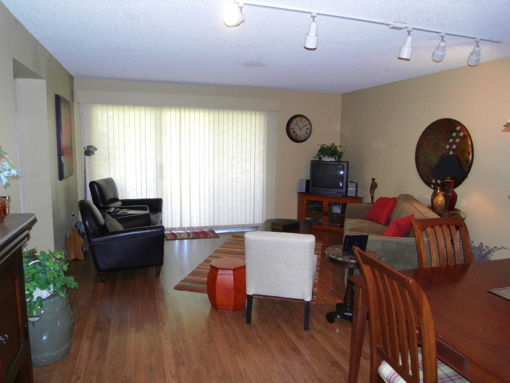 709 South Power Road, Unit 204 Mesa, AZ 85206 - Photo 8 of 27 Living Room w/Beautiful Wood Floors