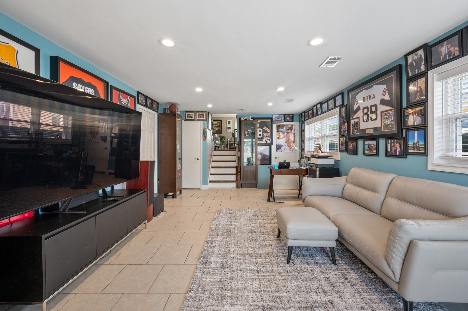 8426 West Betty Terrace Niles, IL 60714 - Photo 12 of 40 a living room with furniture and a flat screen tv