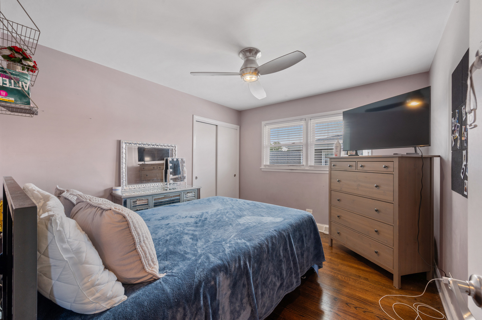 8426 West Betty Terrace Niles, IL 60714 - Photo 20 of 40 a bedroom with a bed and a flat screen tv