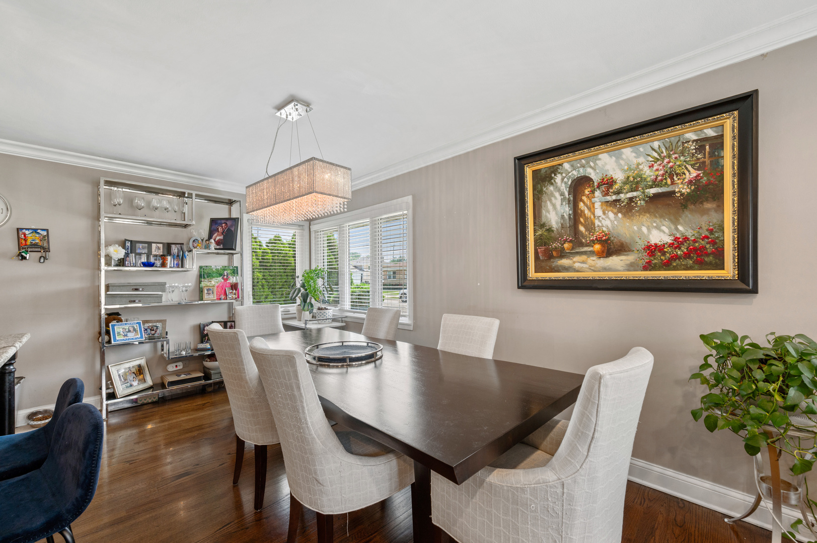 8426 West Betty Terrace Niles, IL 60714 - Photo 8 of 40 a view of a dining room with furniture window and wooden floor
