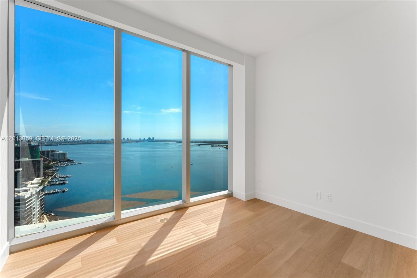 175 Southeast 25th Road, Unit 3601 Miami, FL 33129 - Photo 16 of 27 a view of an empty room and window