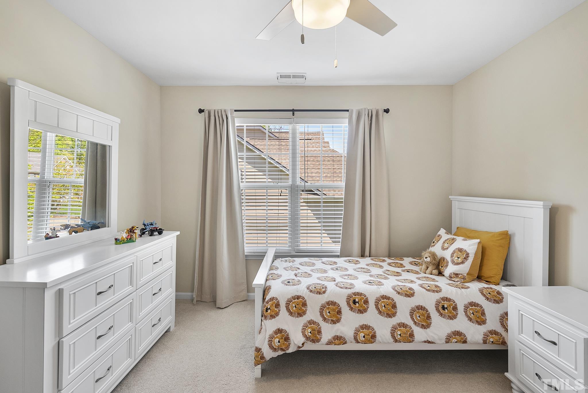 213 Forbes Road Wake Forest, NC 27587 - Photo 26 of 41 a bedroom with a bed and a window