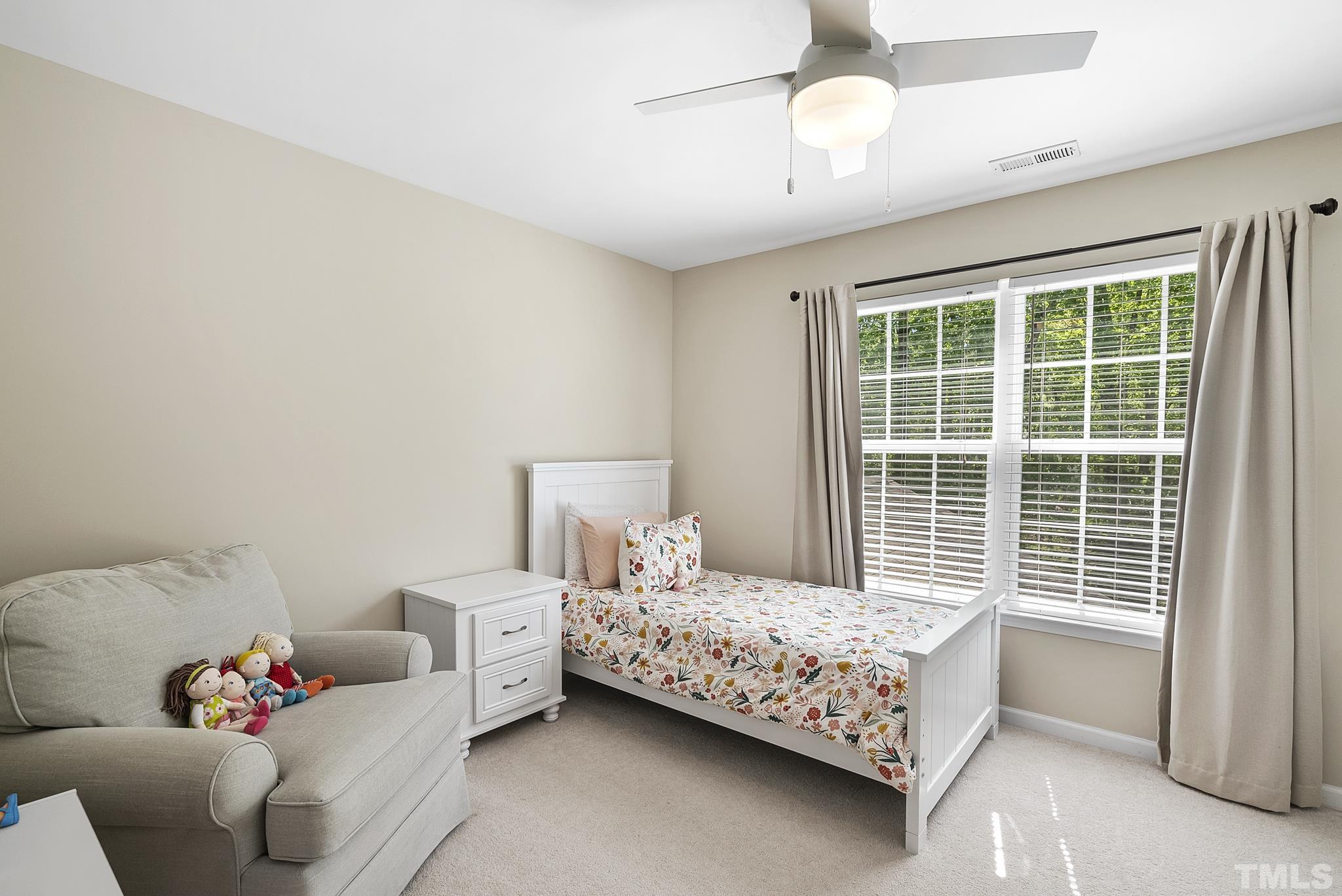 213 Forbes Road Wake Forest, NC 27587 - Photo 28 of 41 a bedroom with a bed and a window