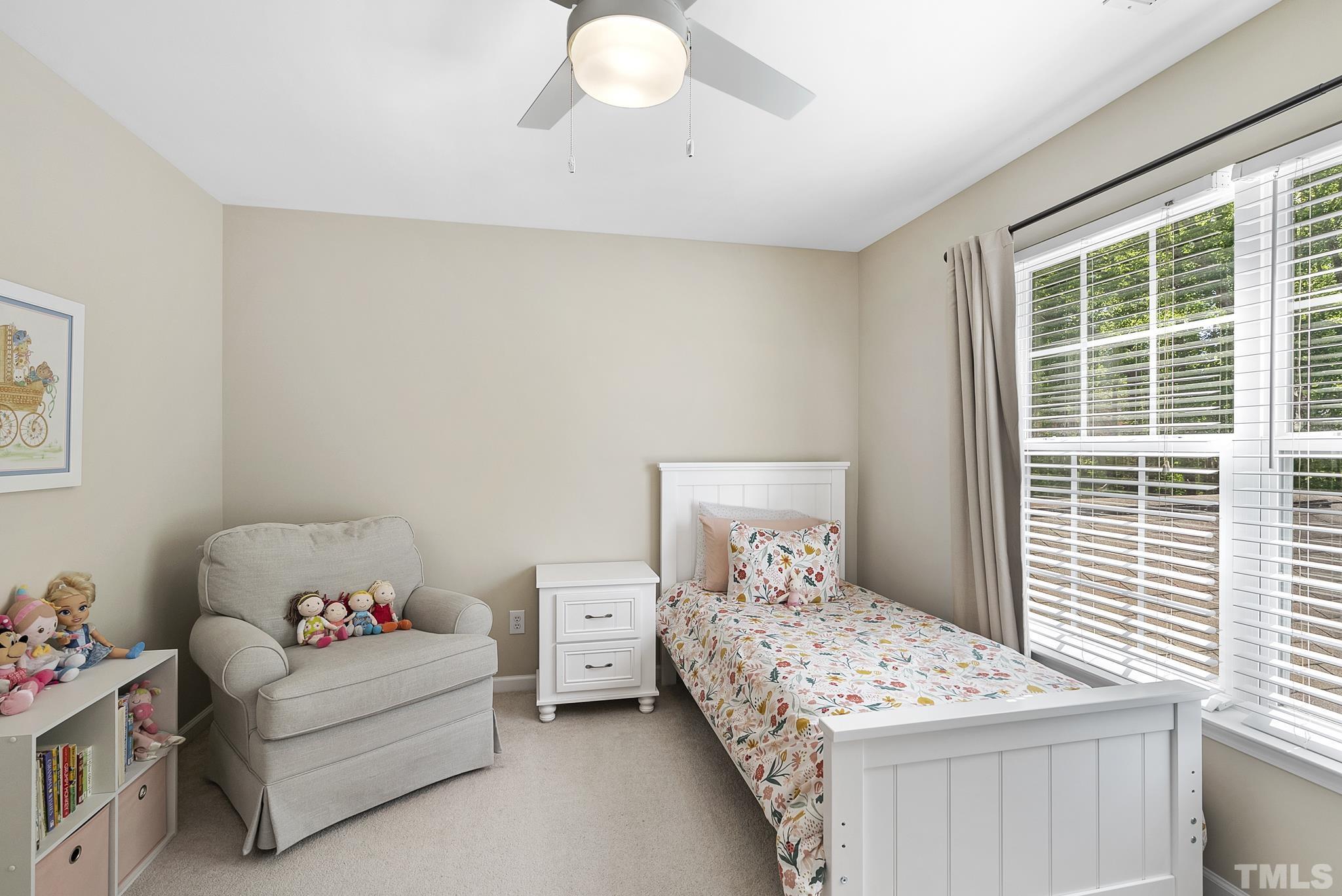 213 Forbes Road Wake Forest, NC 27587 - Photo 29 of 41 a bedroom with a bed and a window