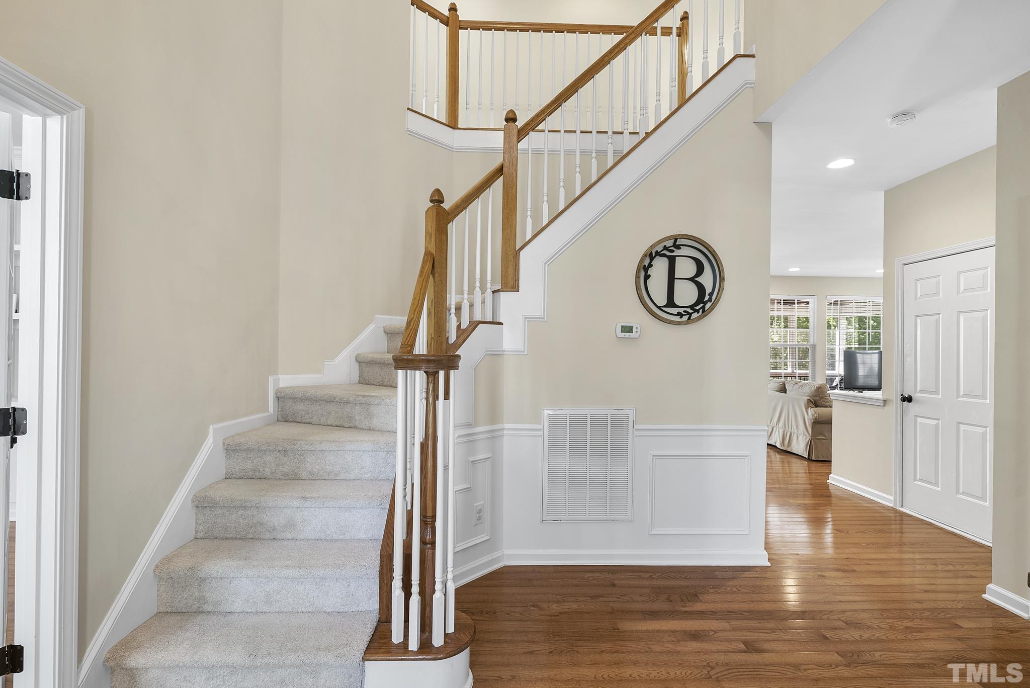 213 Forbes Road Wake Forest, NC 27587 - Photo 3 of 41 a view of entryway and hall with wooden floor