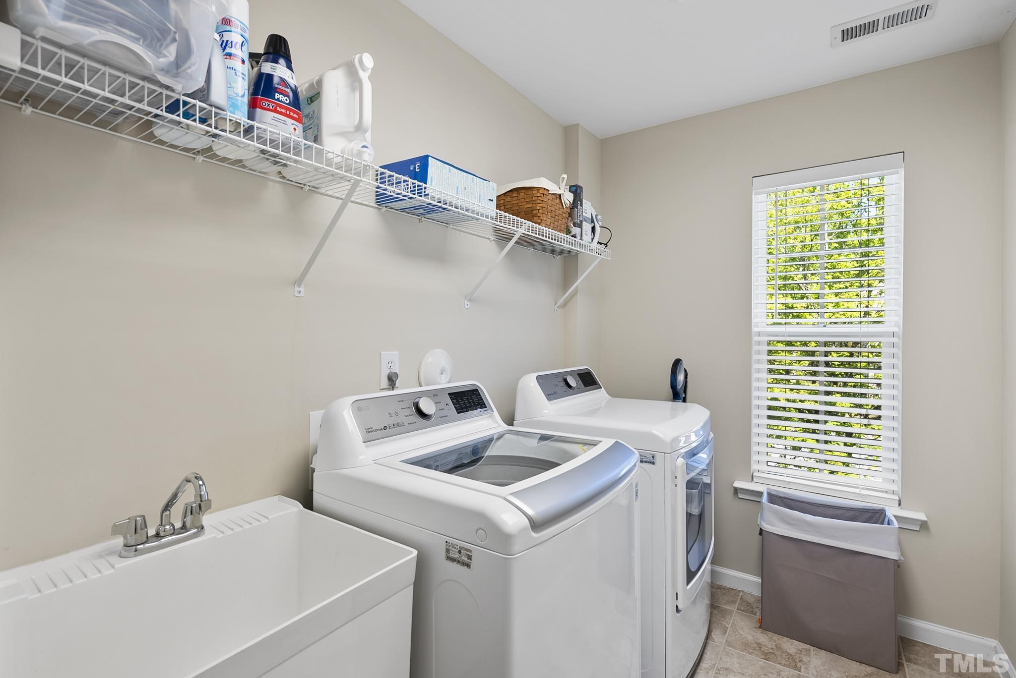 213 Forbes Road Wake Forest, NC 27587 - Photo 32 of 41 a utility room with dryer and washer