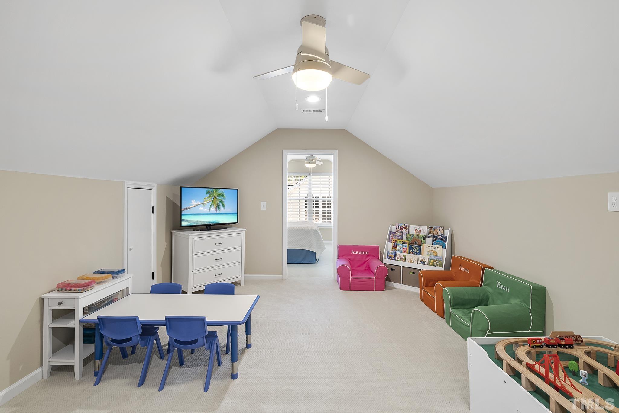 213 Forbes Road Wake Forest, NC 27587 - Photo 37 of 41 a bedroom with furniture and a bed