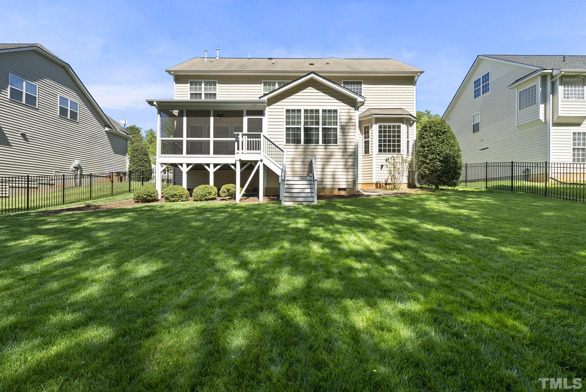 213 Forbes Road Wake Forest, NC 27587 - Photo 40 of 41 a view of a house with a yard
