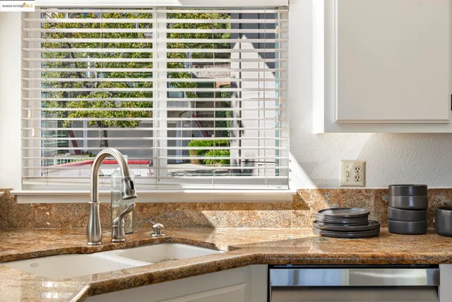 a kitchen with a stove and a microwave