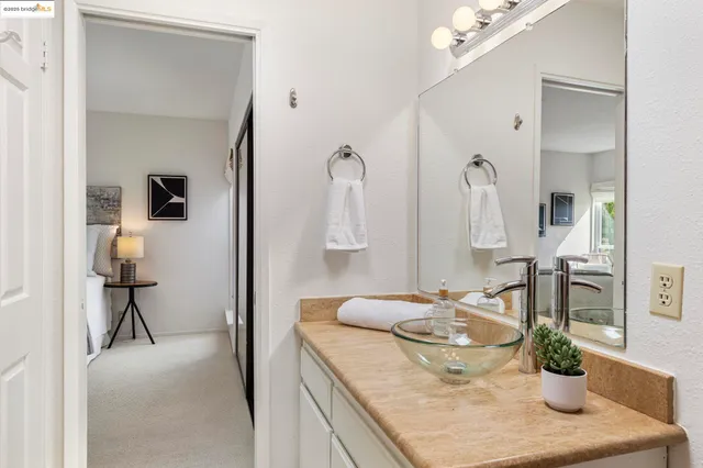 a view of a hallway view with staircase