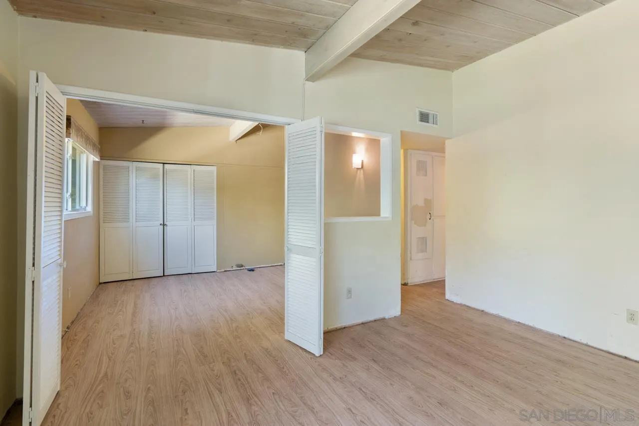 8670 Golden Ridge Road Lakeside, CA 92040 - Photo 14 of 31 wooden floor in an empty room