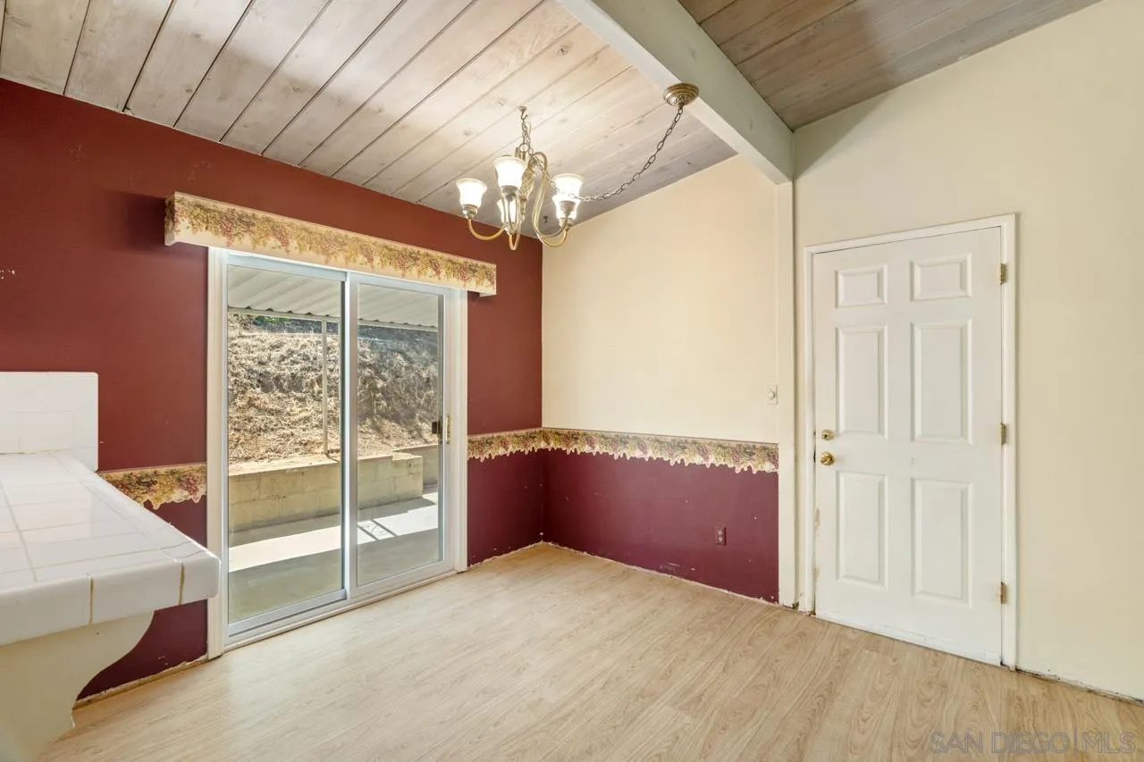 8670 Golden Ridge Road Lakeside, CA 92040 - Photo 22 of 31 a view of an empty room with a window