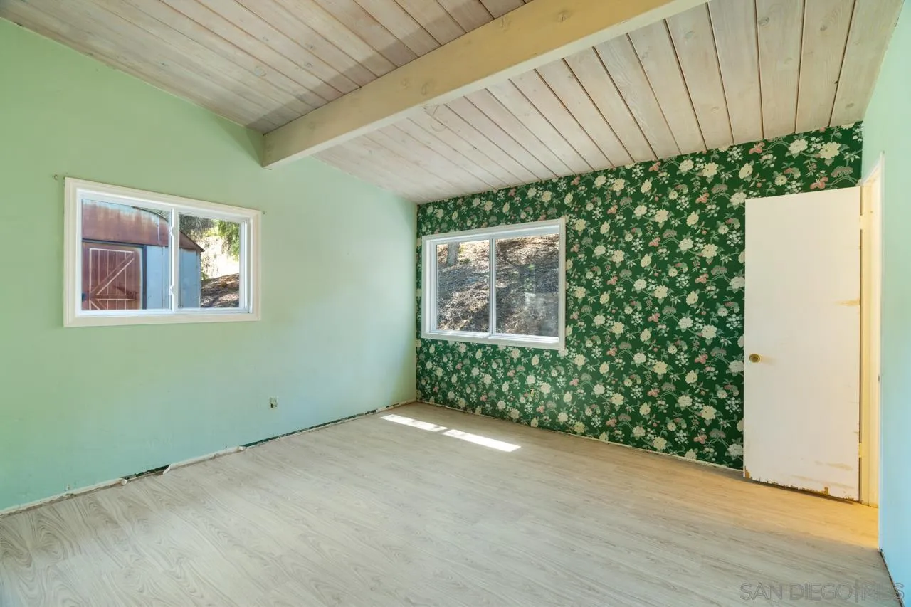 8670 Golden Ridge Road Lakeside, CA 92040 - Photo 23 of 31 a view of an empty room with a window