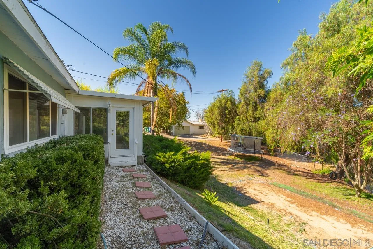 8670 Golden Ridge Road Lakeside, CA 92040 - Photo 3 of 31 a view of a house with a yard