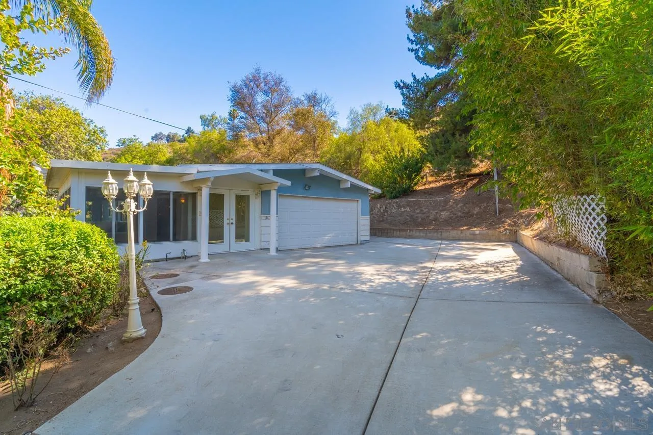 8670 Golden Ridge Road Lakeside, CA 92040 - Photo 4 of 31 a view of a house with a yard