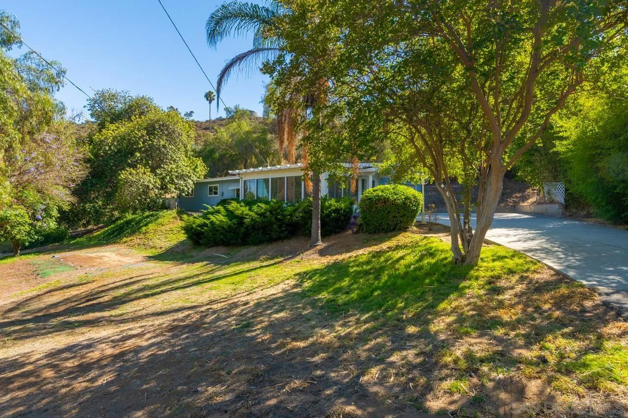 8670 Golden Ridge Road Lakeside, CA 92040 - Photo 6 of 31 a view of a yard with plants and large trees