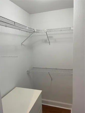 a view of a room with racks on the wall